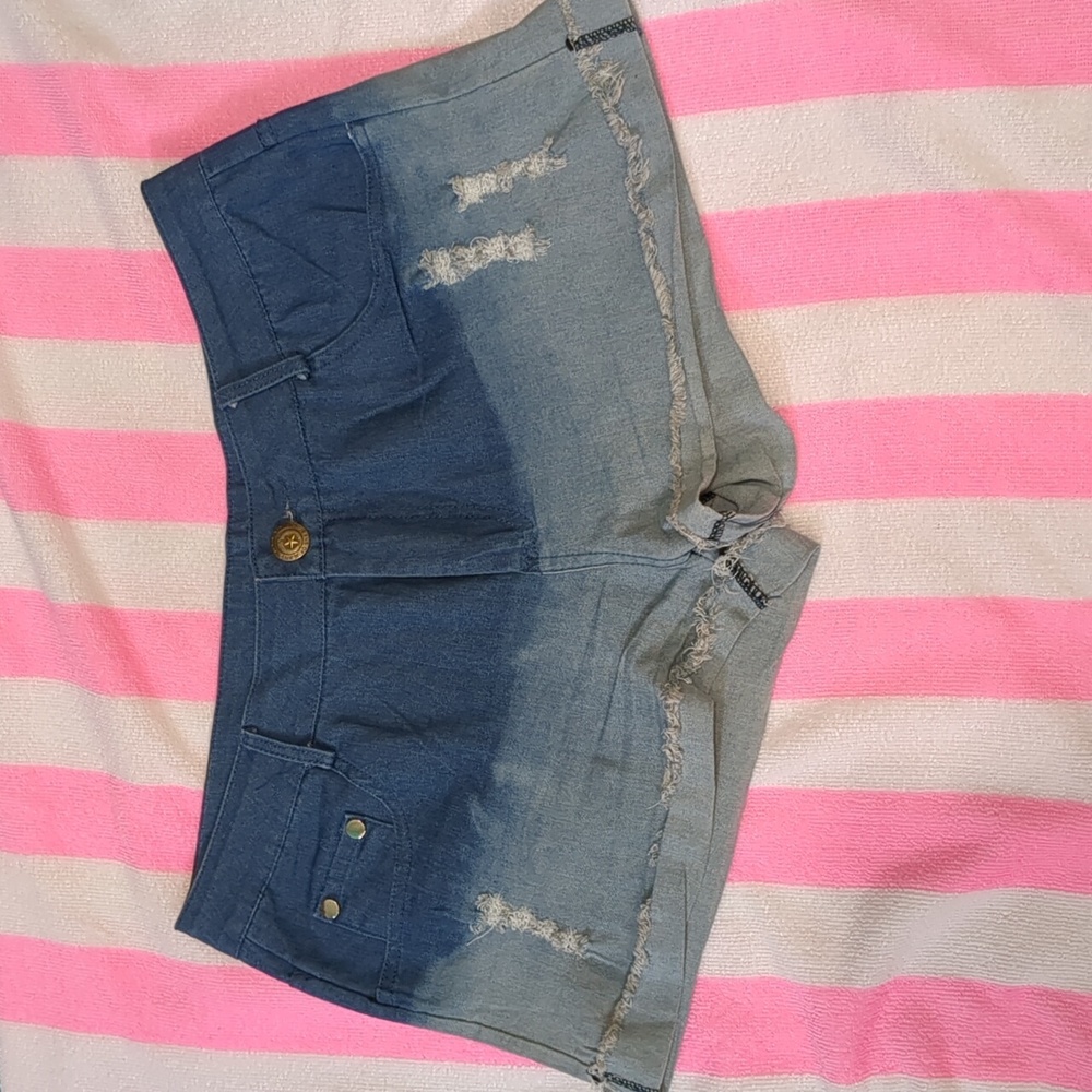Blue ombre denim shorts.